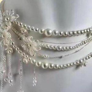 silver and pearl belt with floral details