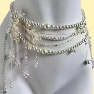 silver and white pearl necklace with floral details